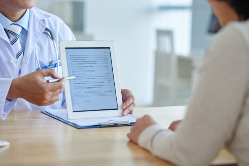 doctor with digital tablet